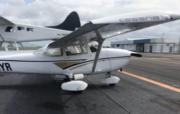 Light plane on tarmac, for conventional surveys